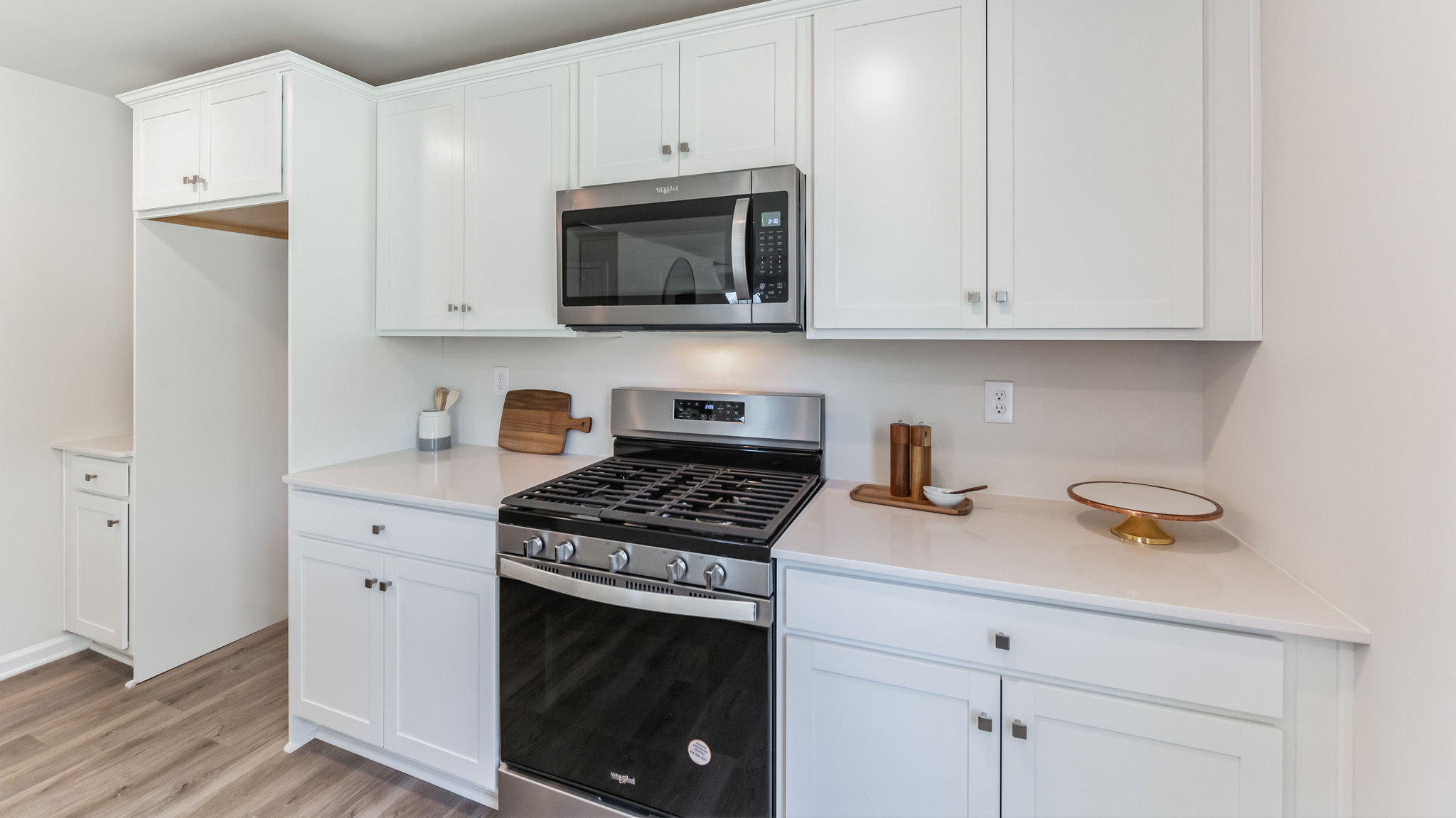 The kitchen offers sleek stainless steel appliances.