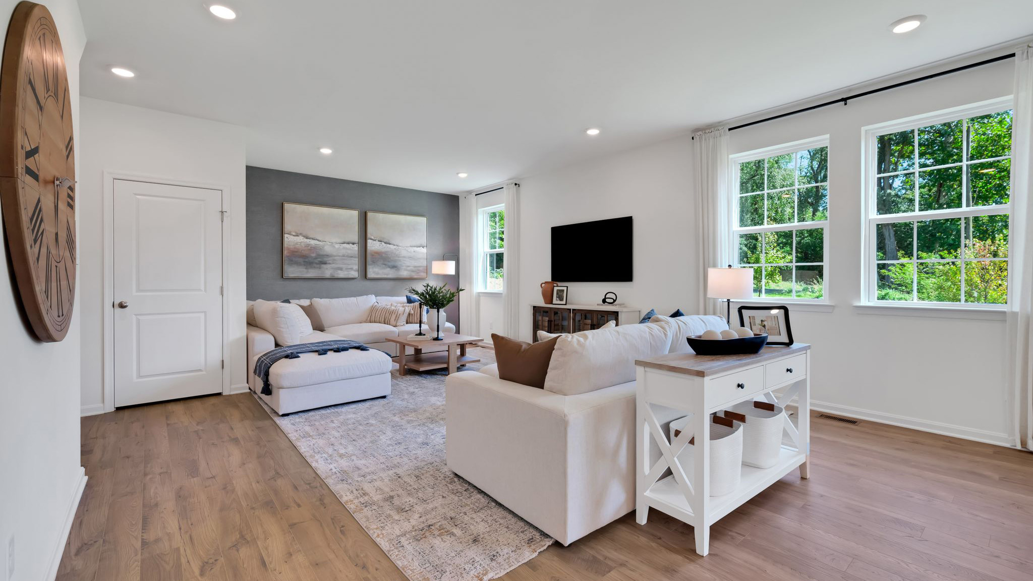 The great room with three windows.