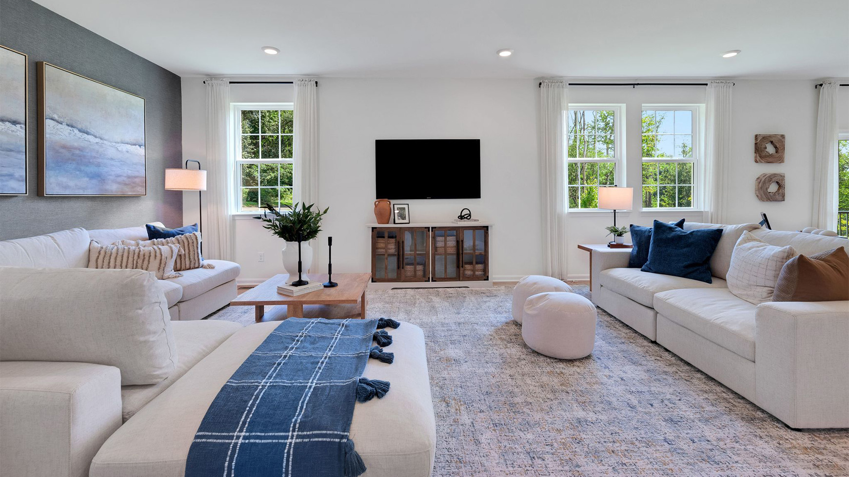 The great room with three windows.