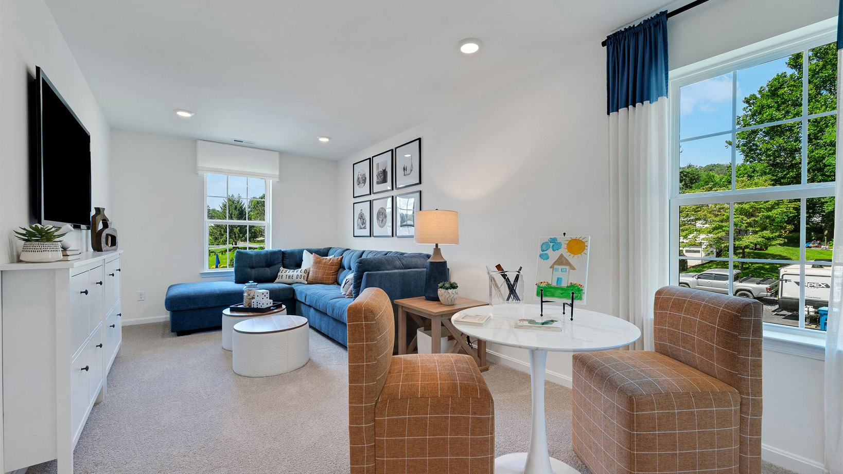 The upstairs living can also be used as an area of relaxation with wall mounted TV.