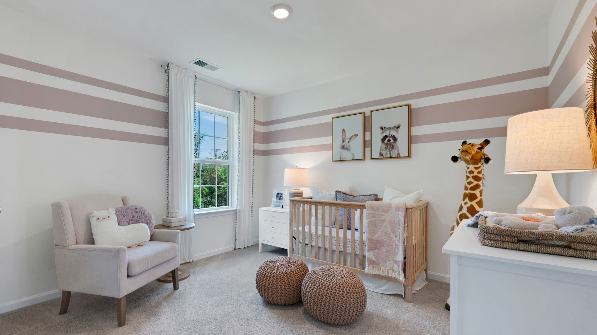 Three generously sized secondary bedrooms, and a hall bathroom with double vanity complete the upstairs.