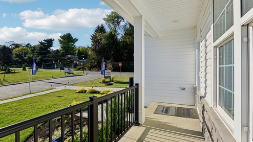 A view from the covered front porch looking towards Erica Lane