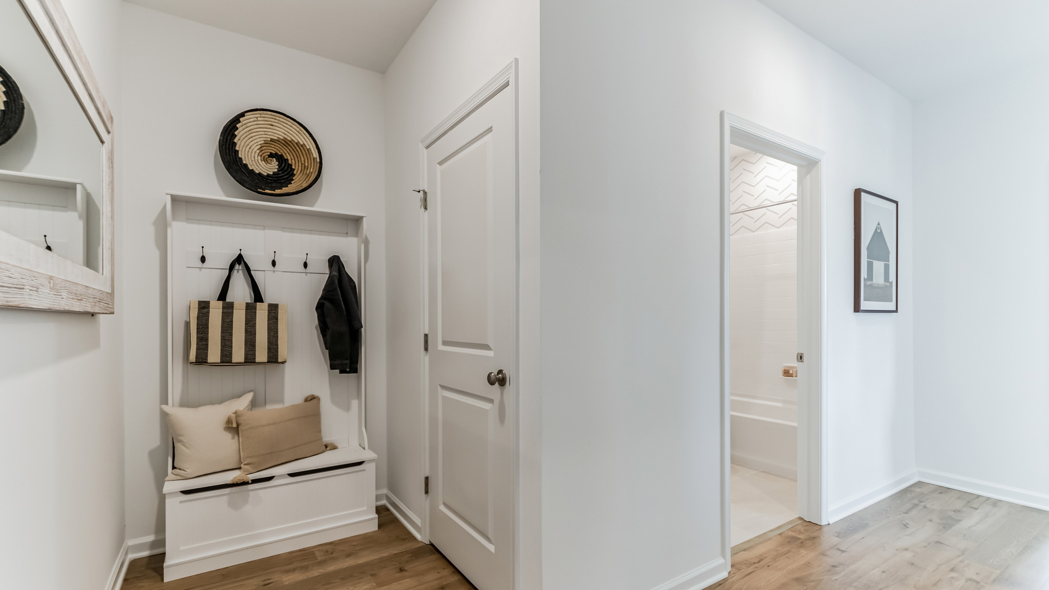 Entryway storage bench to conveniently take the day off right when you walk in.