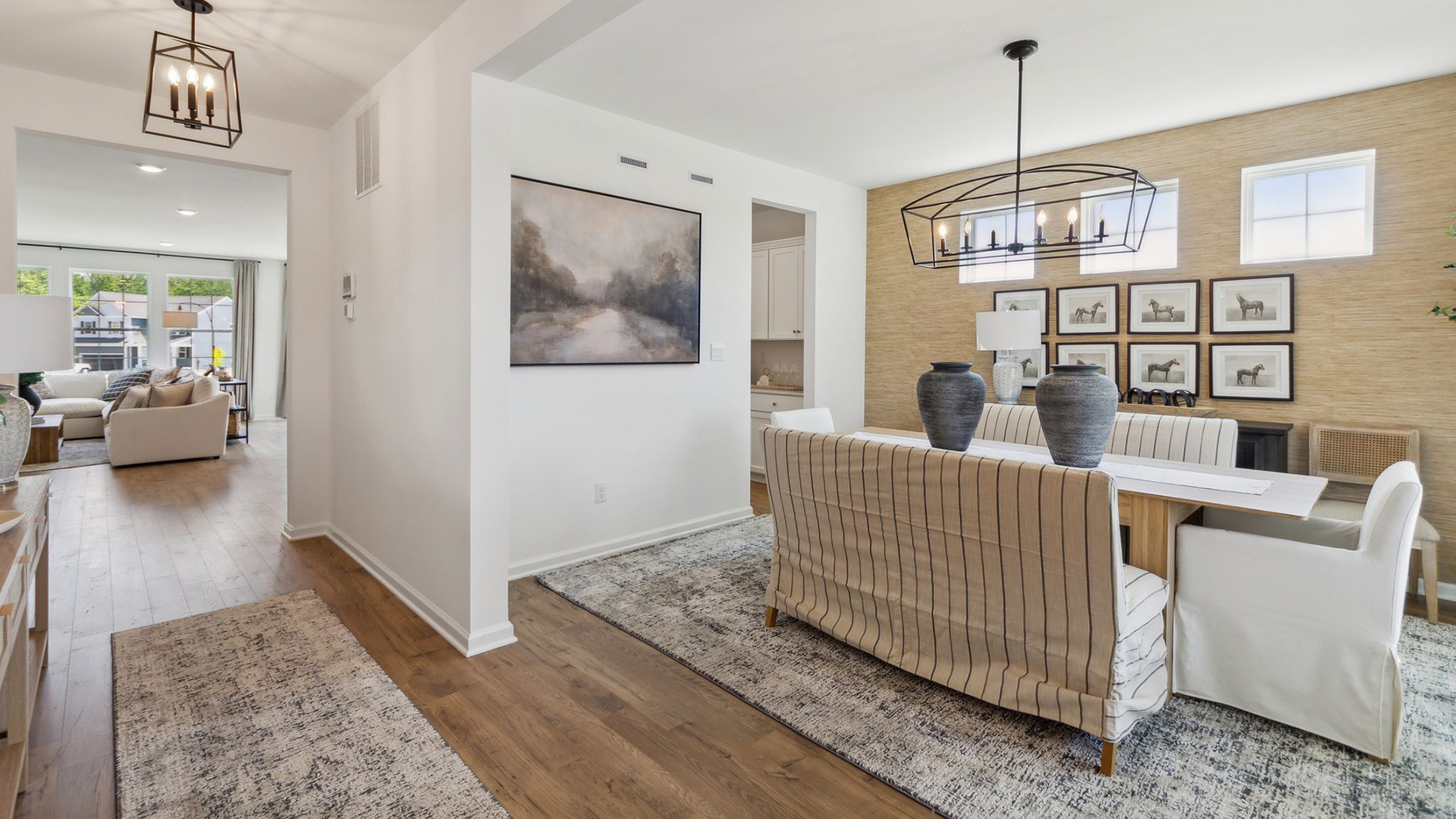Formal dining room near the entrance. The foyer hall looks into the living area.