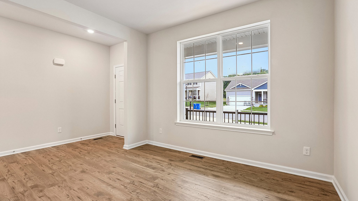 Bright front flex room featuring abundant natural light and versatile space that can adapt to changing household needs.