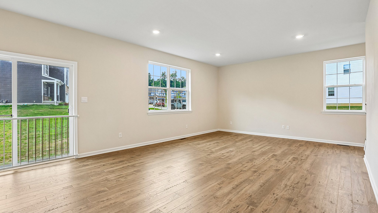 Expansive open-concept main living area designed for seamless entertaining, everyday comfort, and connection throughout the home.
