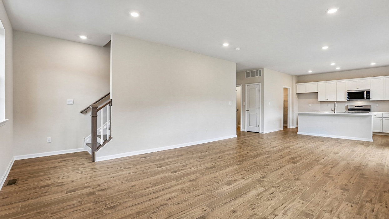 Spacious great room with an open-concept design, creating a natural flow between the kitchen, dining, and living areas.