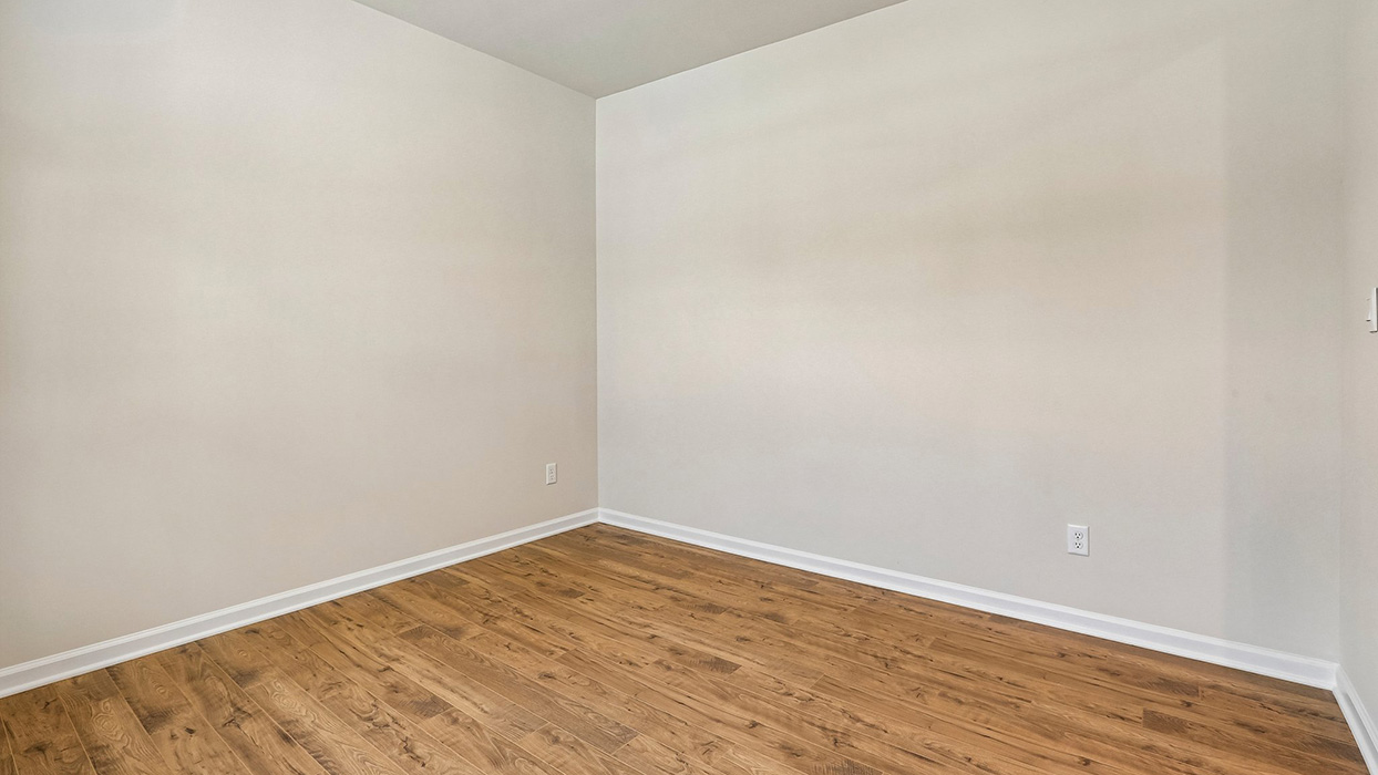 Flexible main-level room offering additional living space that can accommodate a home office, study area, or hobby room.