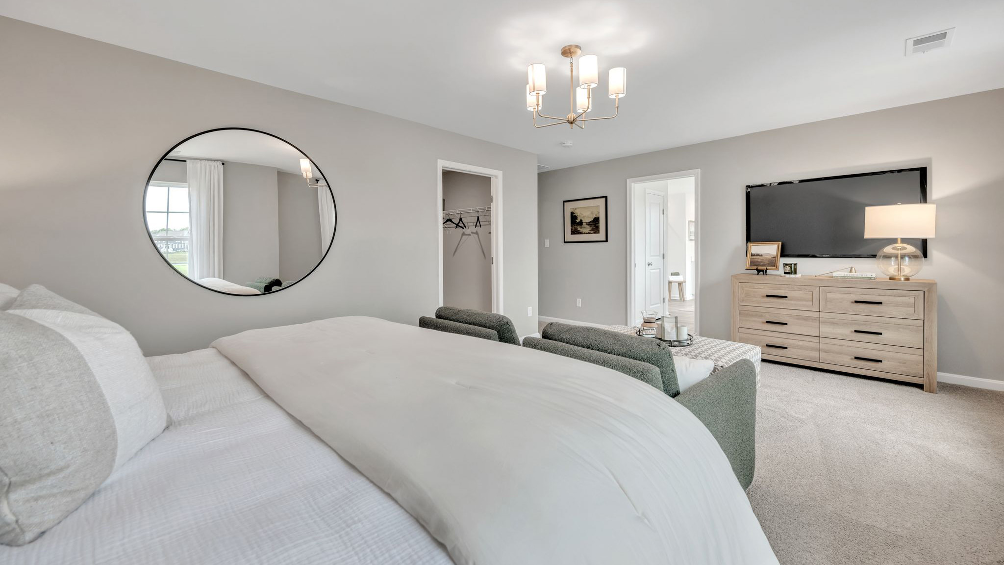 The impressive owner’s suite boasts an expansive bedroom and a contemporary owner’s bathroom.