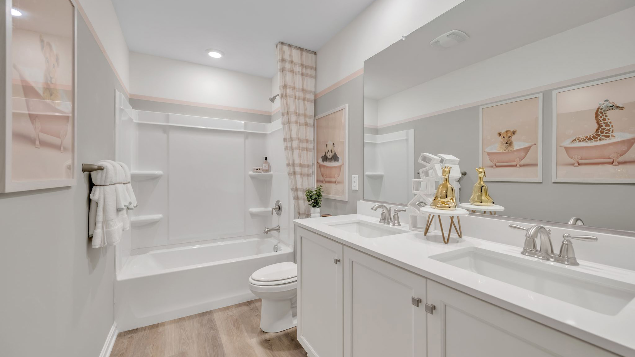 The guest bathroom with single vanity.