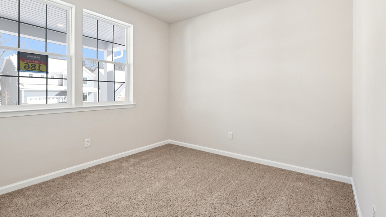 Bedroom two with two windows