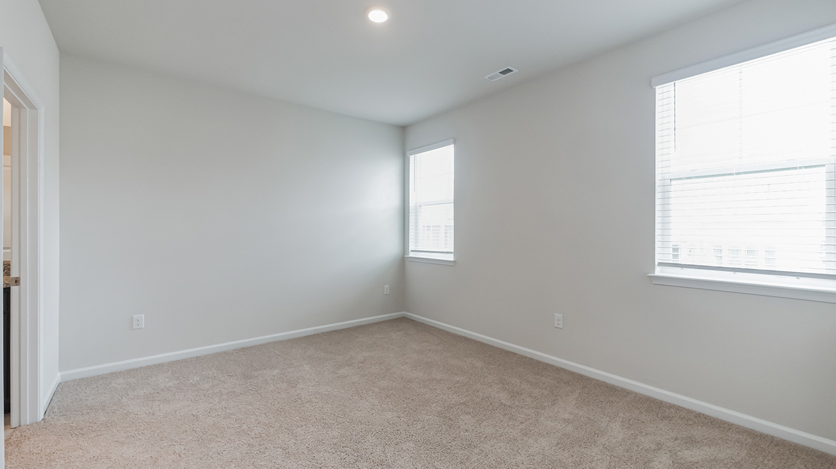 The primary bedroom is located of the living area.