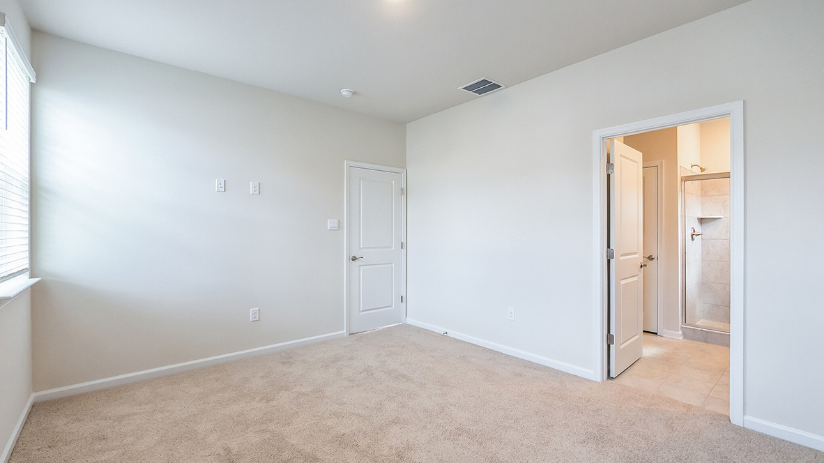 The primary bedroom has an en suite bathroom.