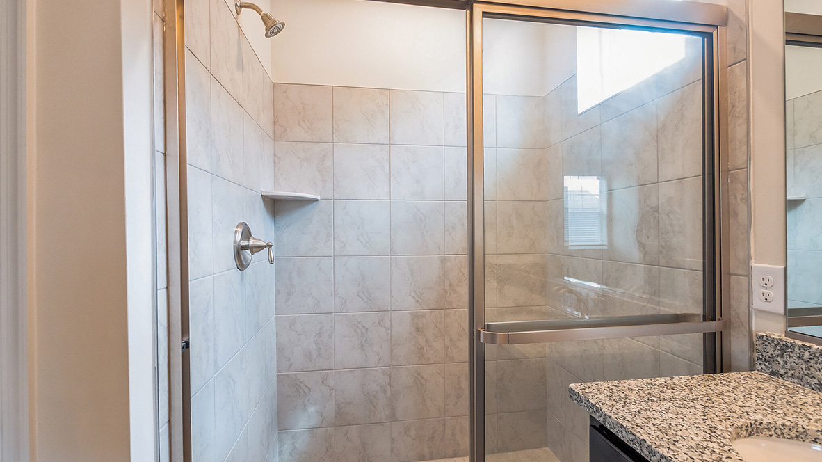 The primary bathroom has a walk-in shower.