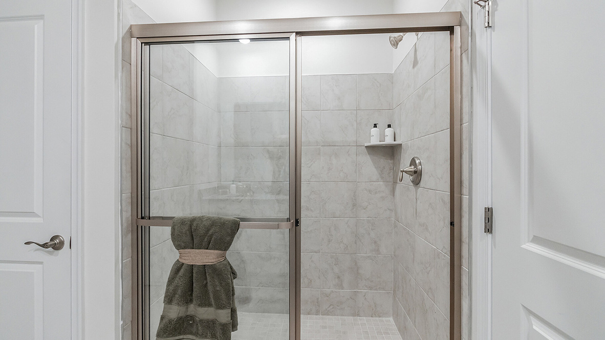 The primary bathroom has a walk-in shower.