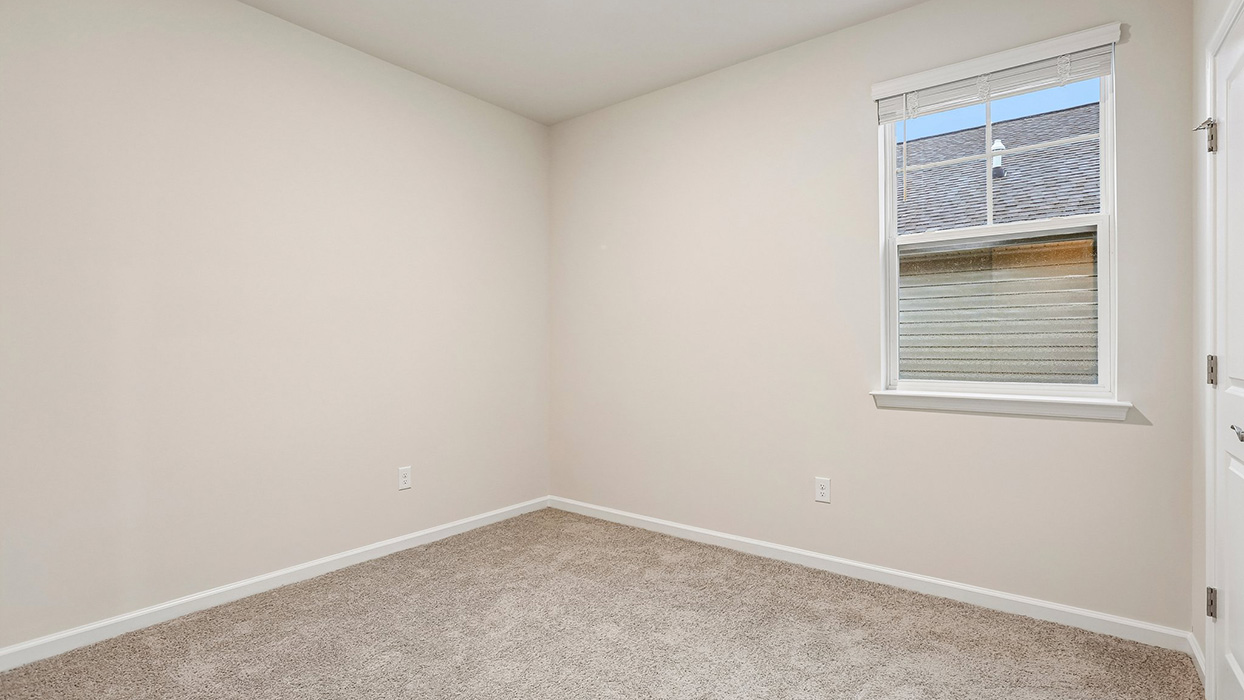 Secondary bedroom designed for comfort and functionality with room to grow alongside changing lifestyle needs.