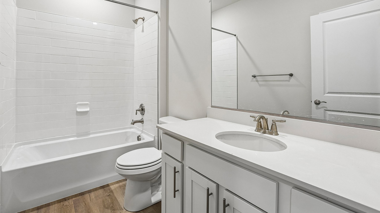 Dedicated laundry room offering added convenience and everyday functionality with space for storage and organization.