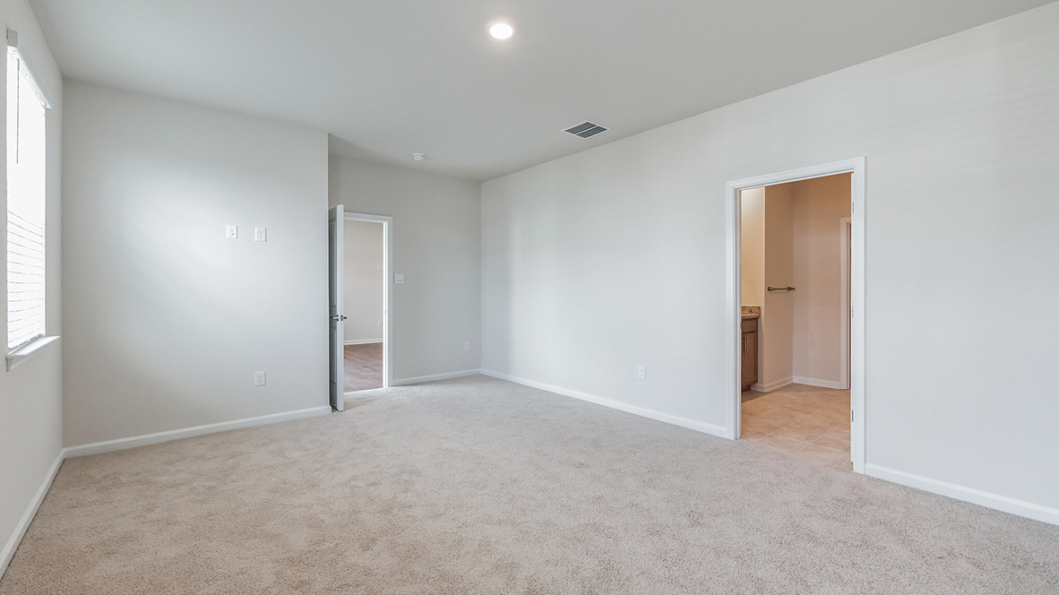 The primary bedroom has an en suite bathroom.