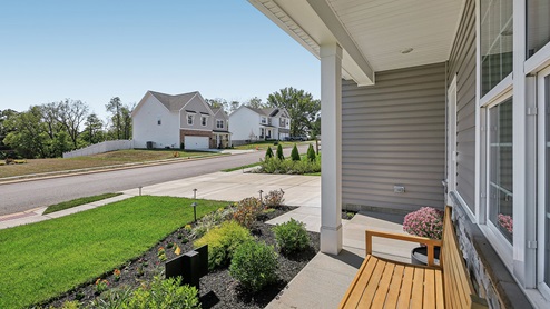 A view from the covered front porch looking towards Bella drive
