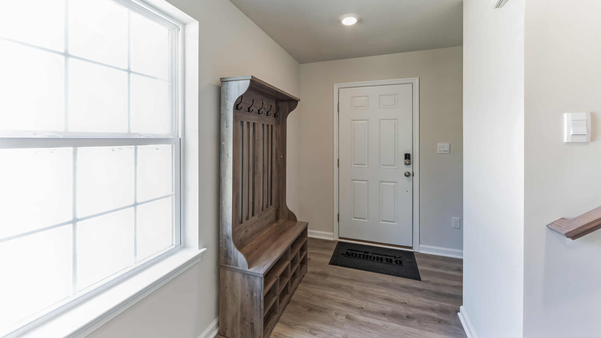 A welcoming foyer greets you as you enter this two-story home.