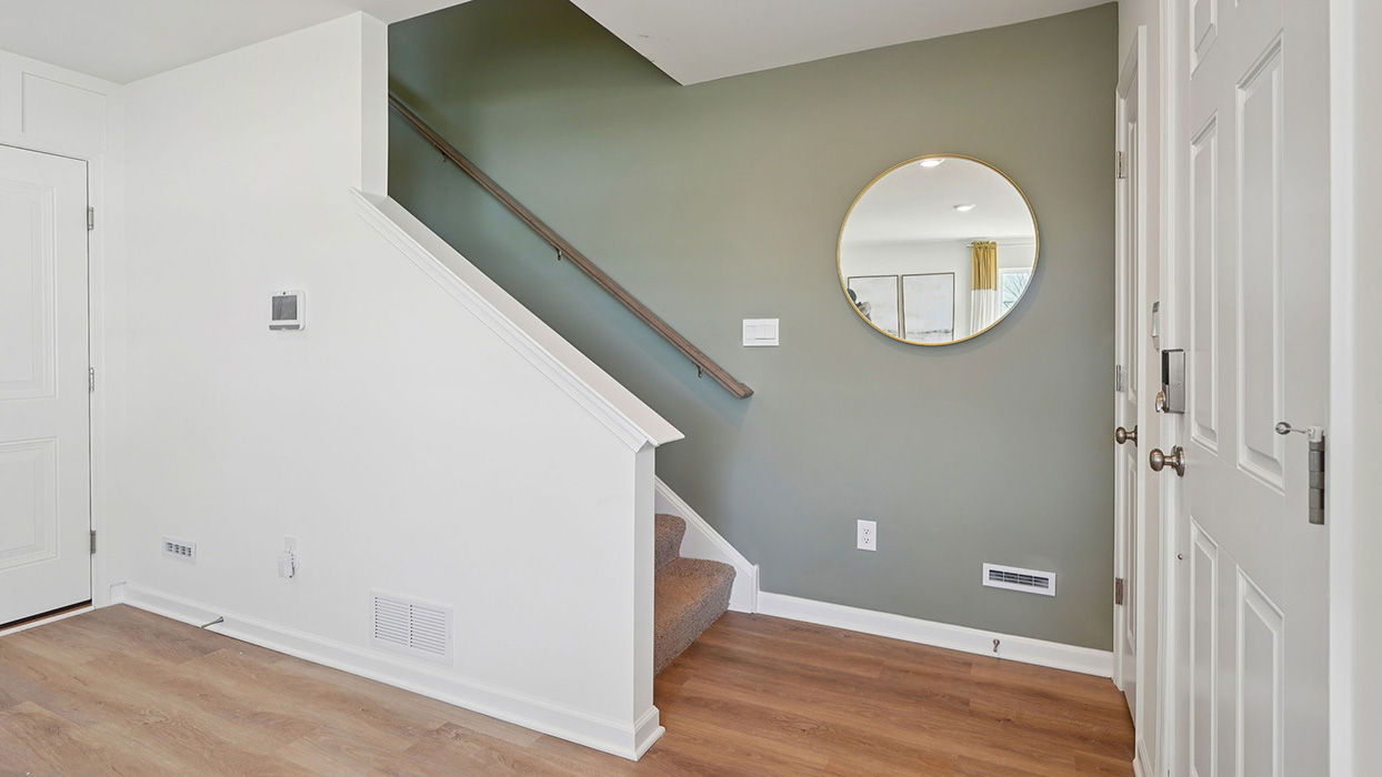 Foyer entrance of the home leads to a large finished recreation room for entertainment