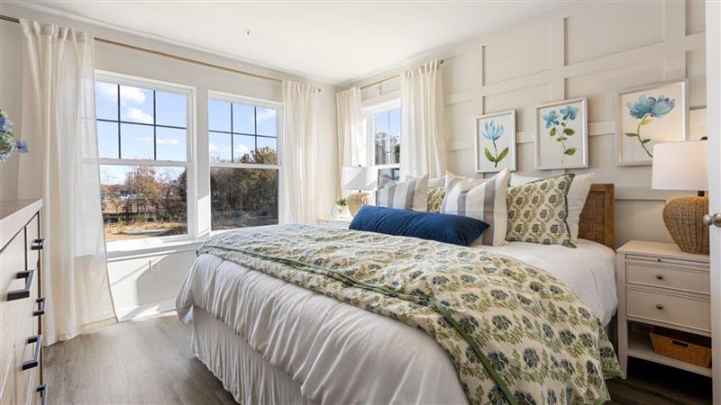 primary bedroom with a king size bed