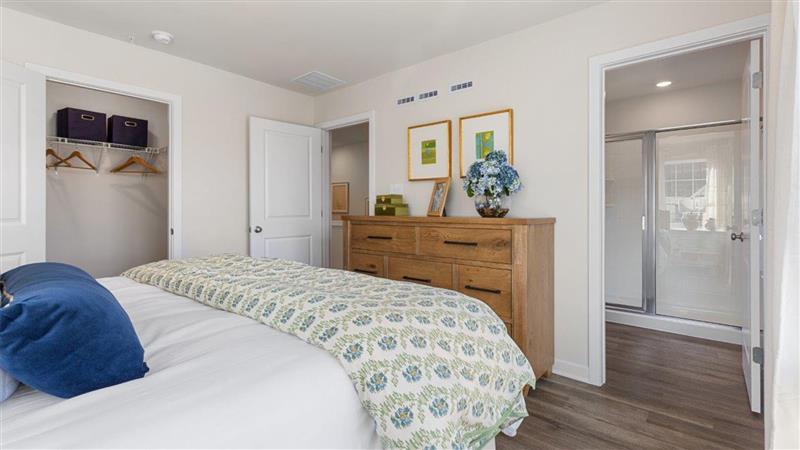 primary bedroom with a king size bed