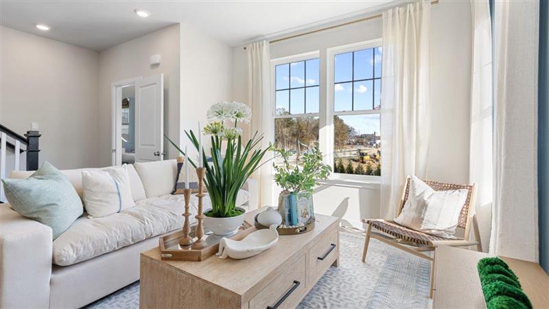 Spacious living room with large windows