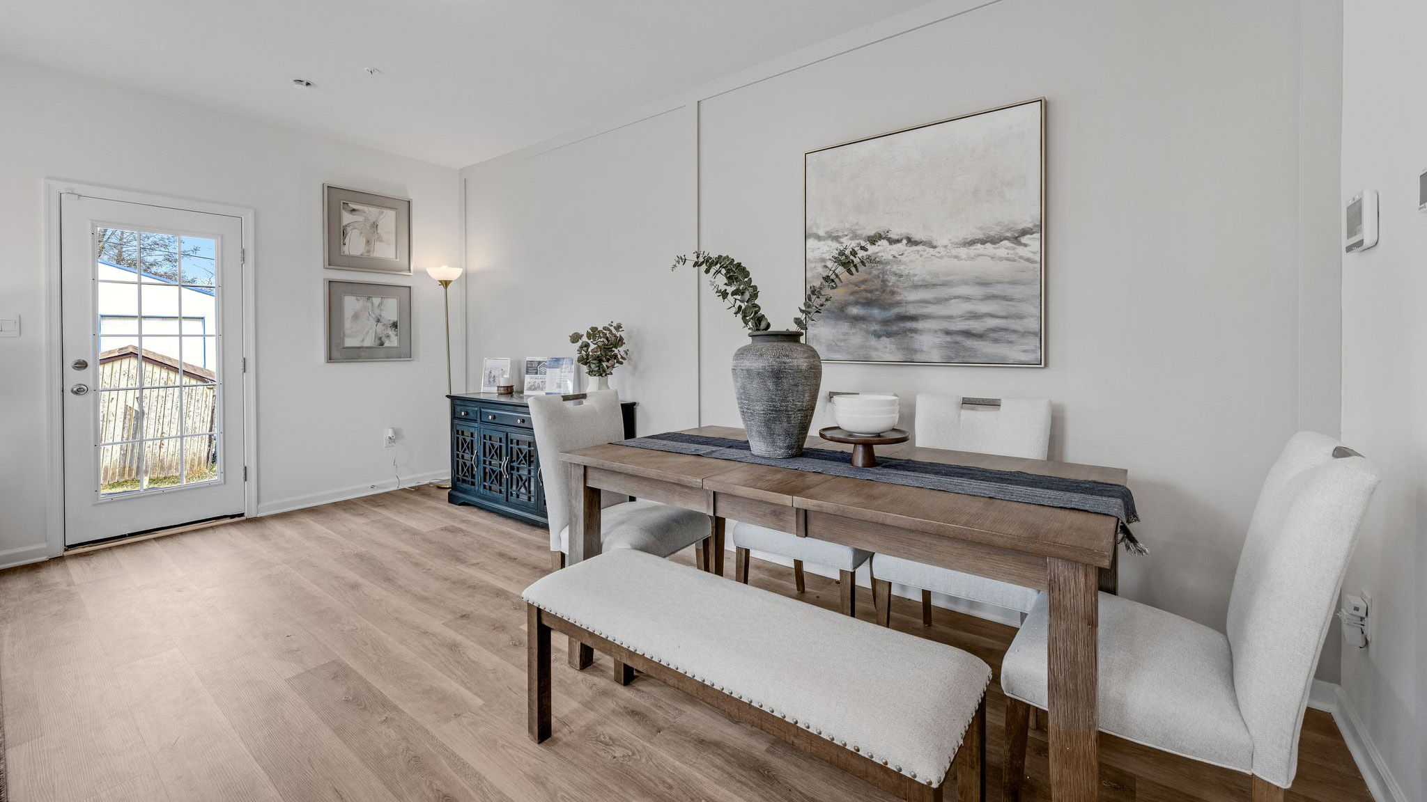 The dining area with the back door in view.