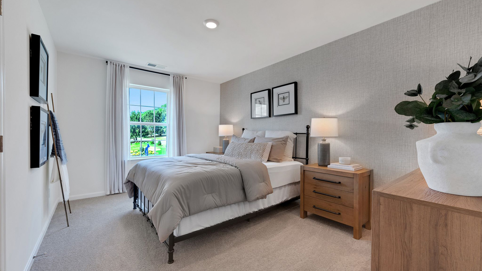 Three generously sized secondary bedrooms, and a hall bathroom with double vanity complete the upstairs.