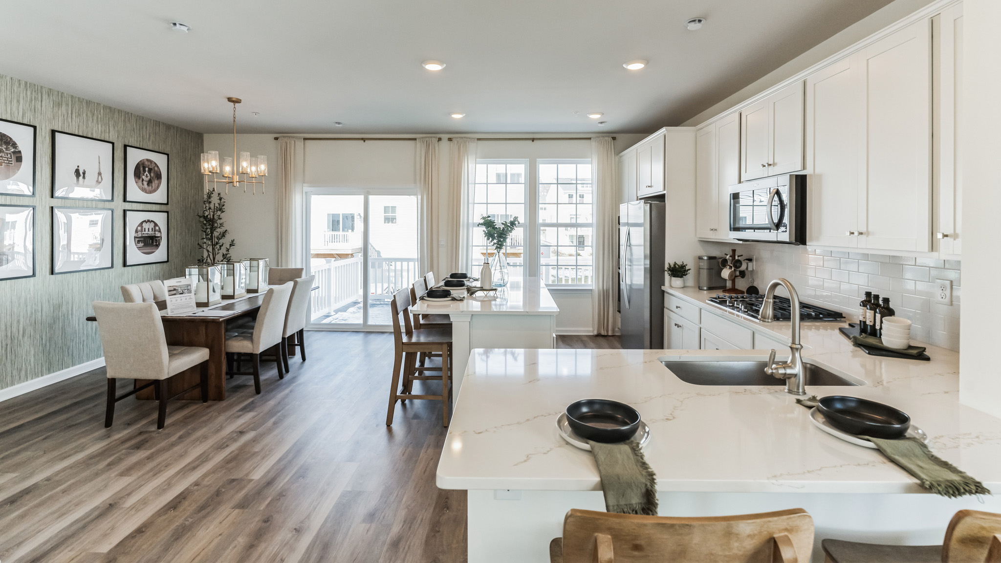 Kitchen and dining area with back sliding glass door to the deck.