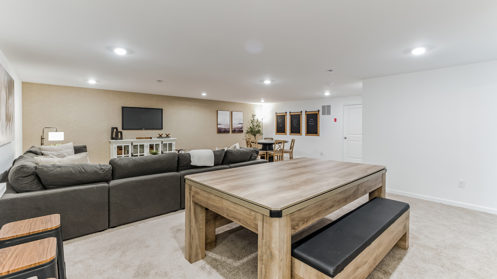 Different view of the large finished basement area.
