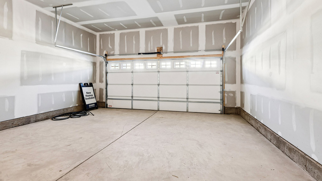 Inside the garage looking towards the garage door