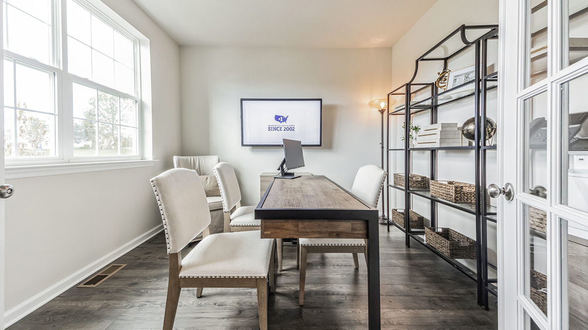 This bedroom could be used as an office space.