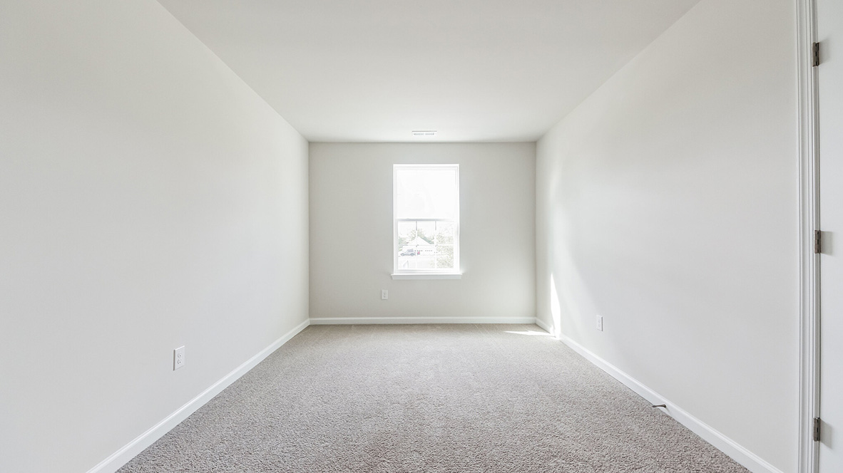 Downstairs room with single window.