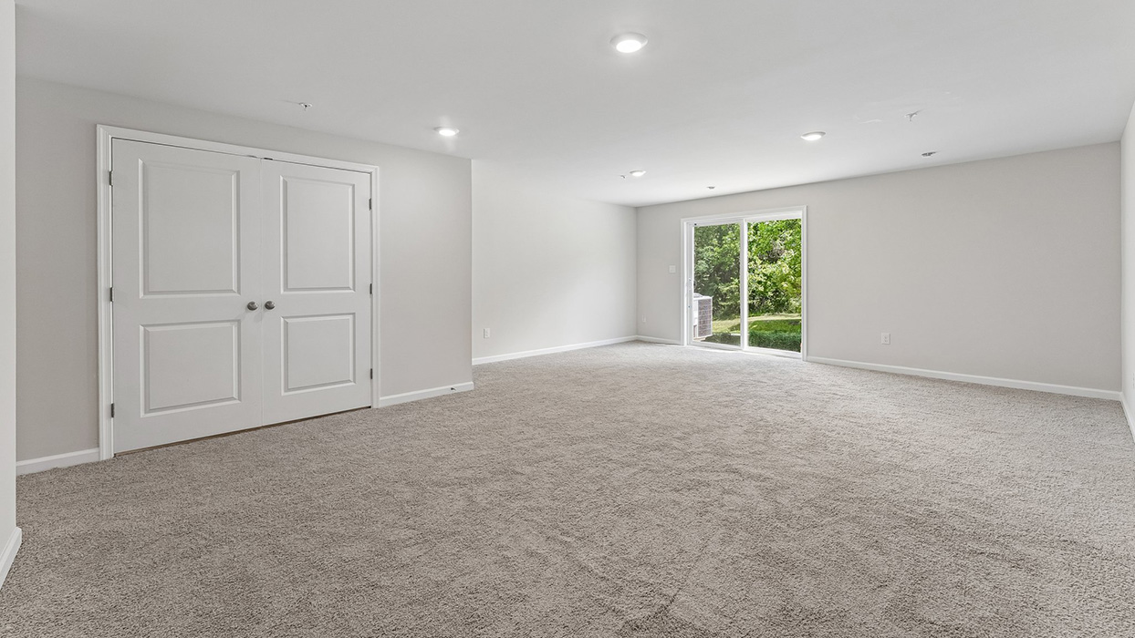 Finished basement with sliding walkout door