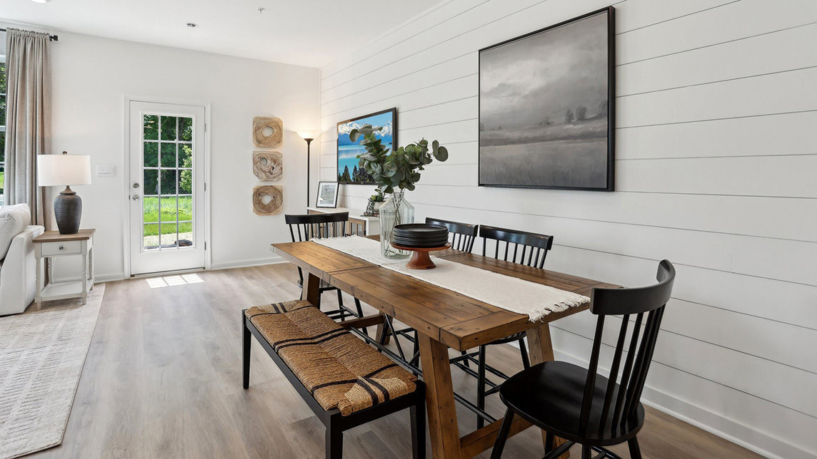 The dining area with the back door in view.