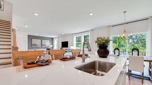 The kitchen flows seamlessly into the dining space and the sizeable great room.