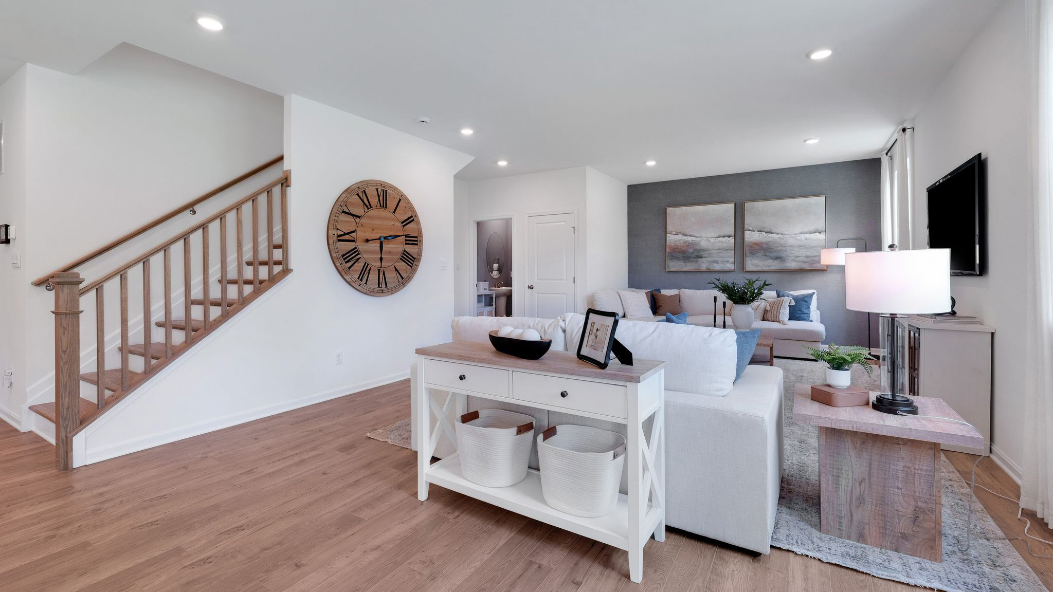 The great room facing the stairwell to the second floor.