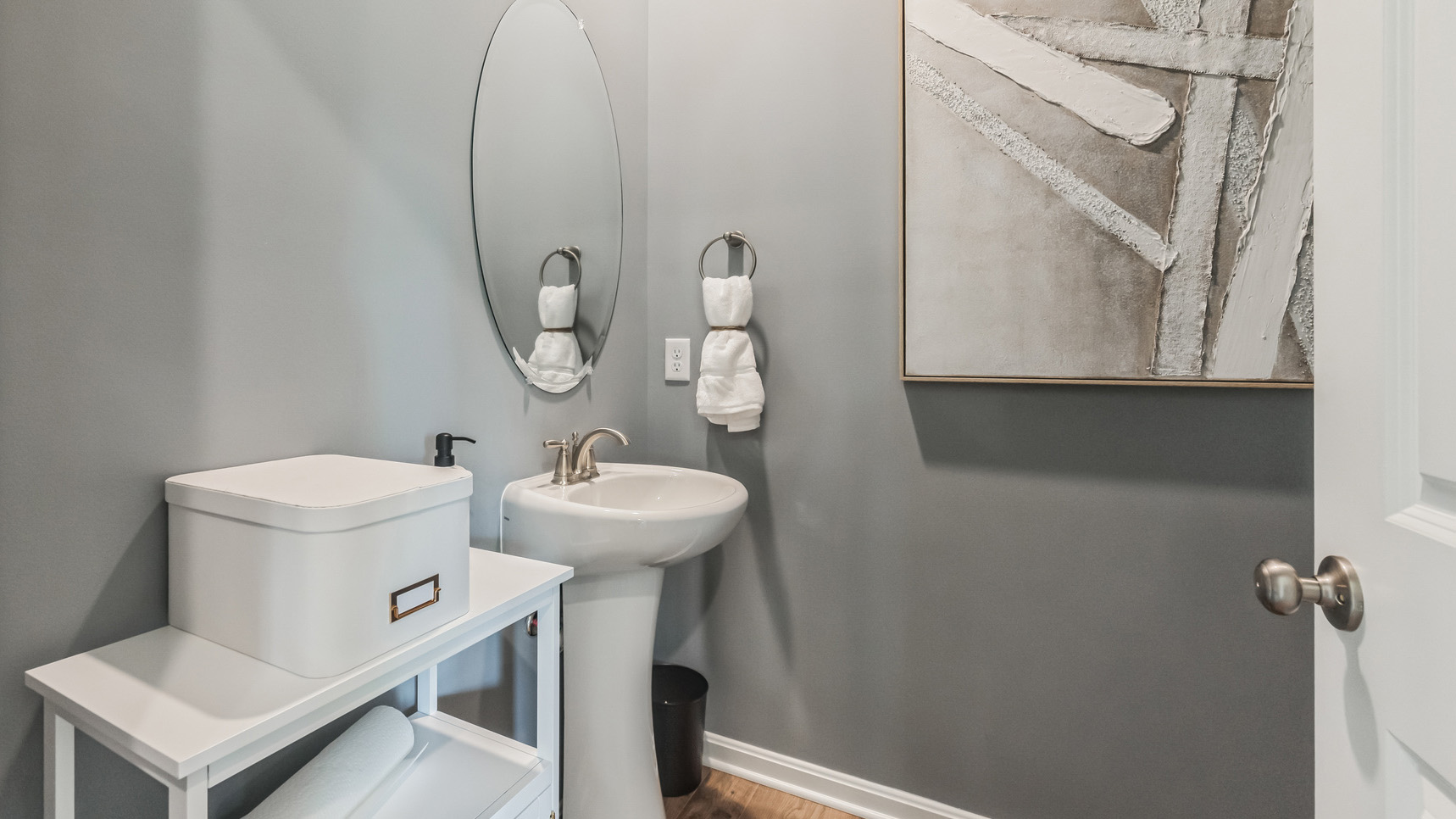 The first floor also offers a powder room.