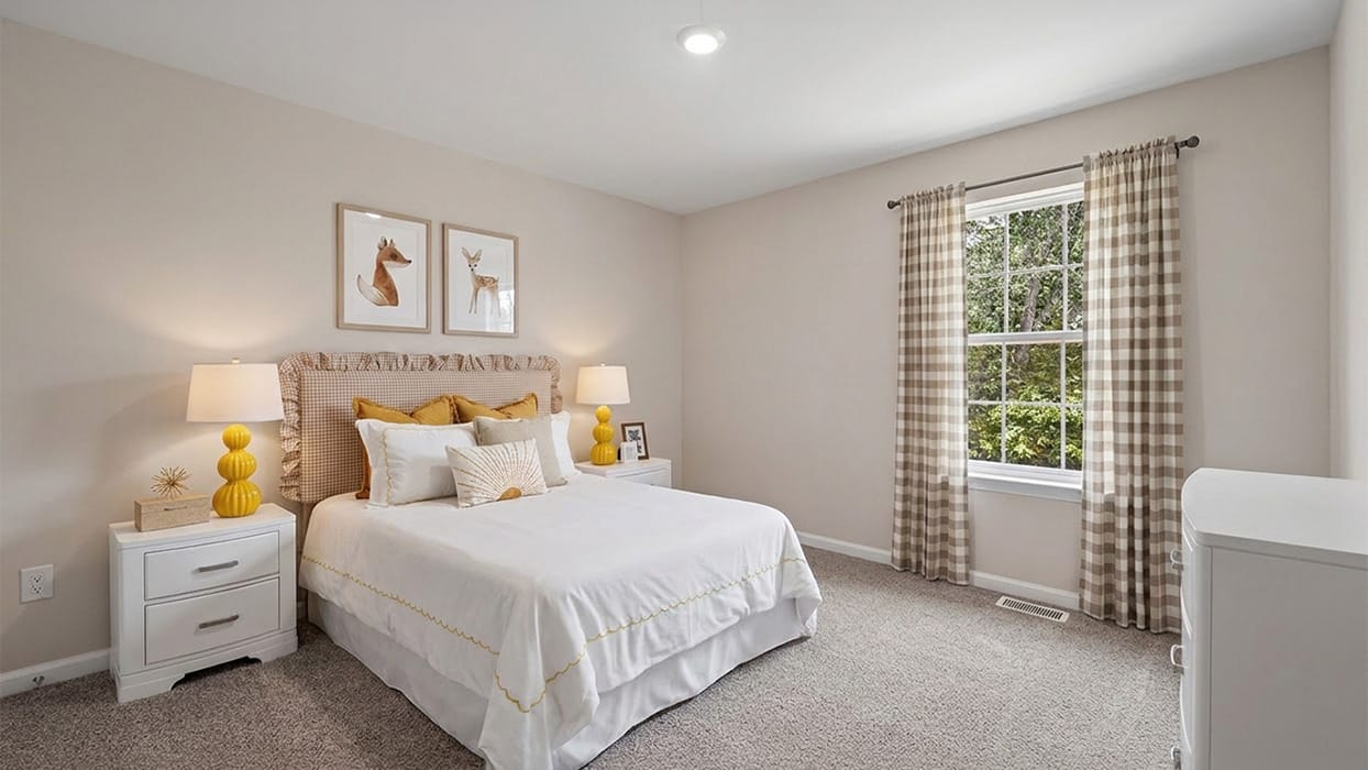 Secondary bedroom with plush carpet, soft neutral walls, and single window bringing in natural light
