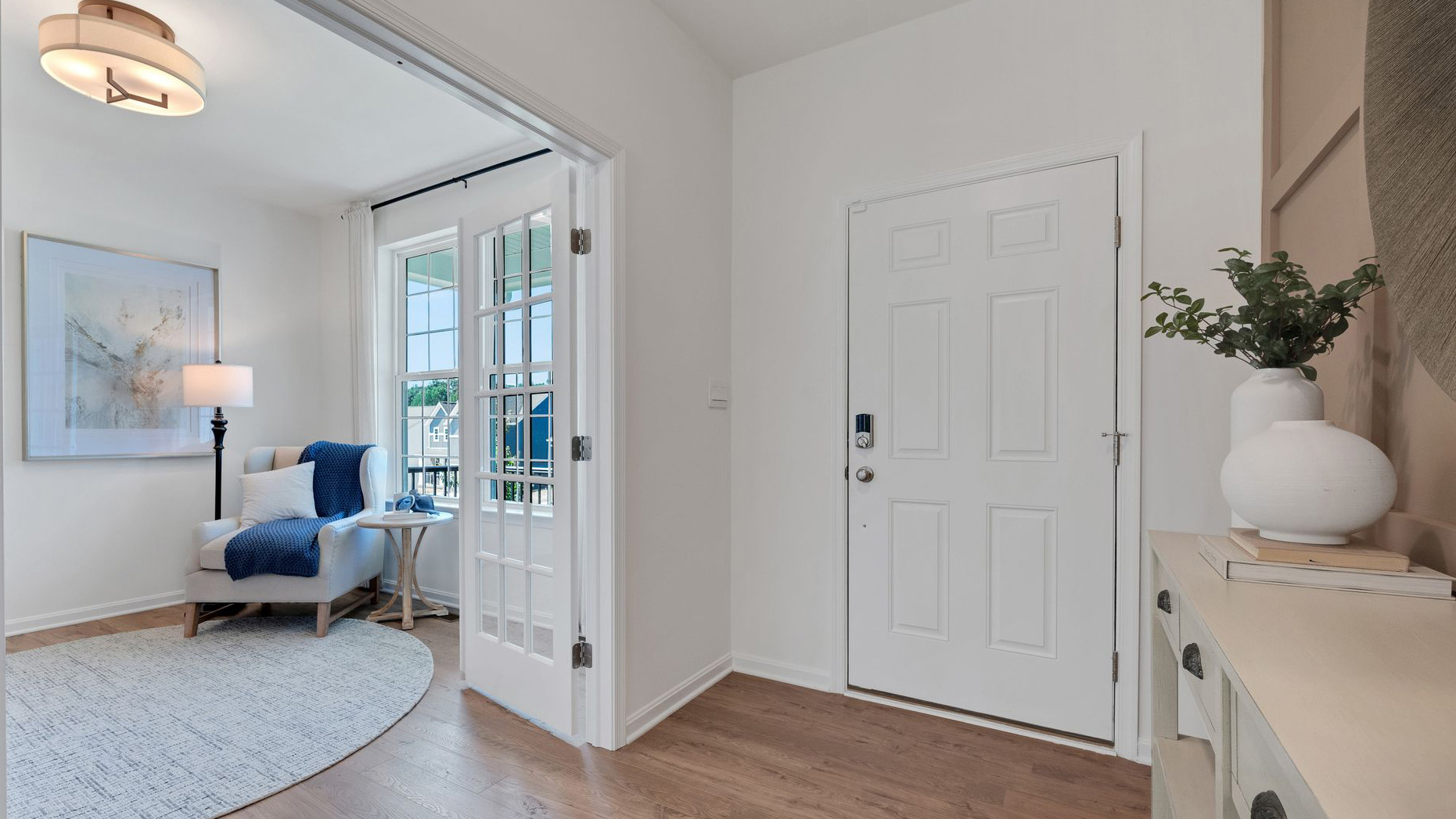 This well-designed home has an inviting foyer that is open to the functional study.