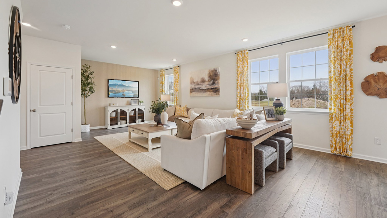 The great room with three windows.