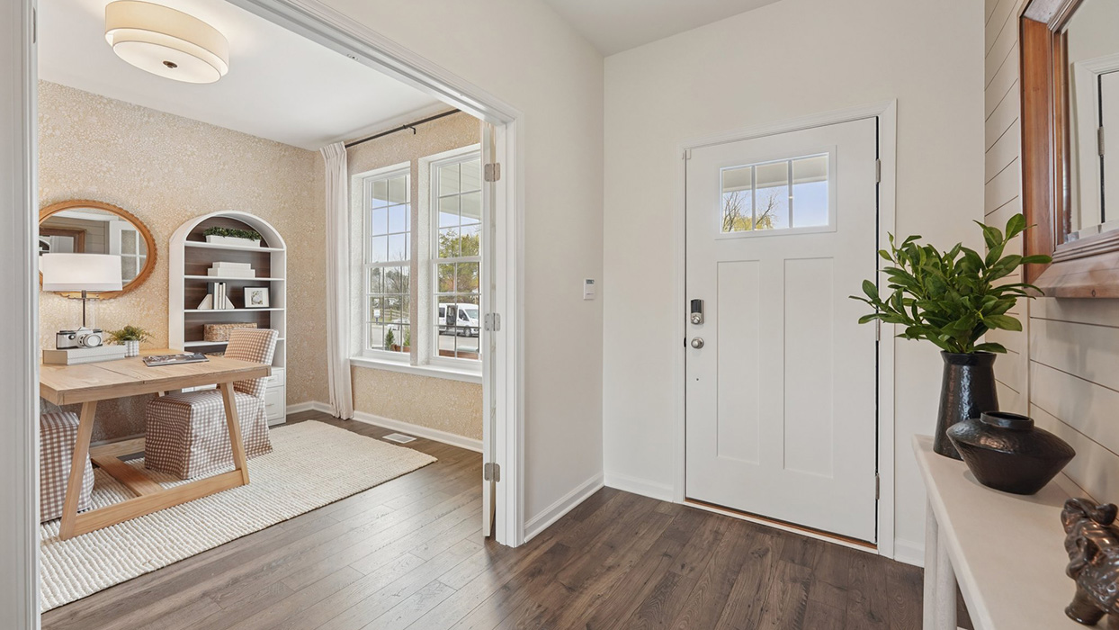 This well-designed home has an inviting foyer that is open to the functional study.