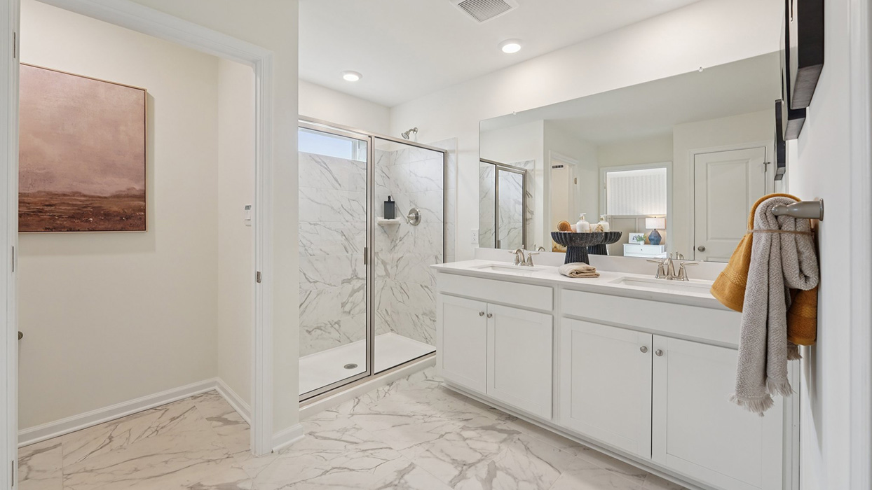 A contemporary owner’s bathroom with a large shower.