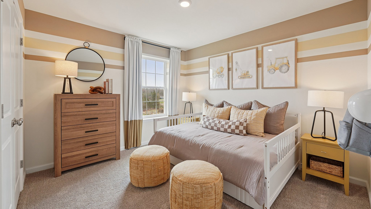 Three generously sized secondary bedrooms, and a hall bathroom with double vanity complete the upstairs.