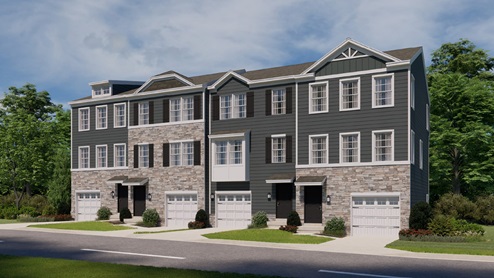 Exterior front image of four connecting townhomes with stone and gray horizontal paneling with white single car garage.