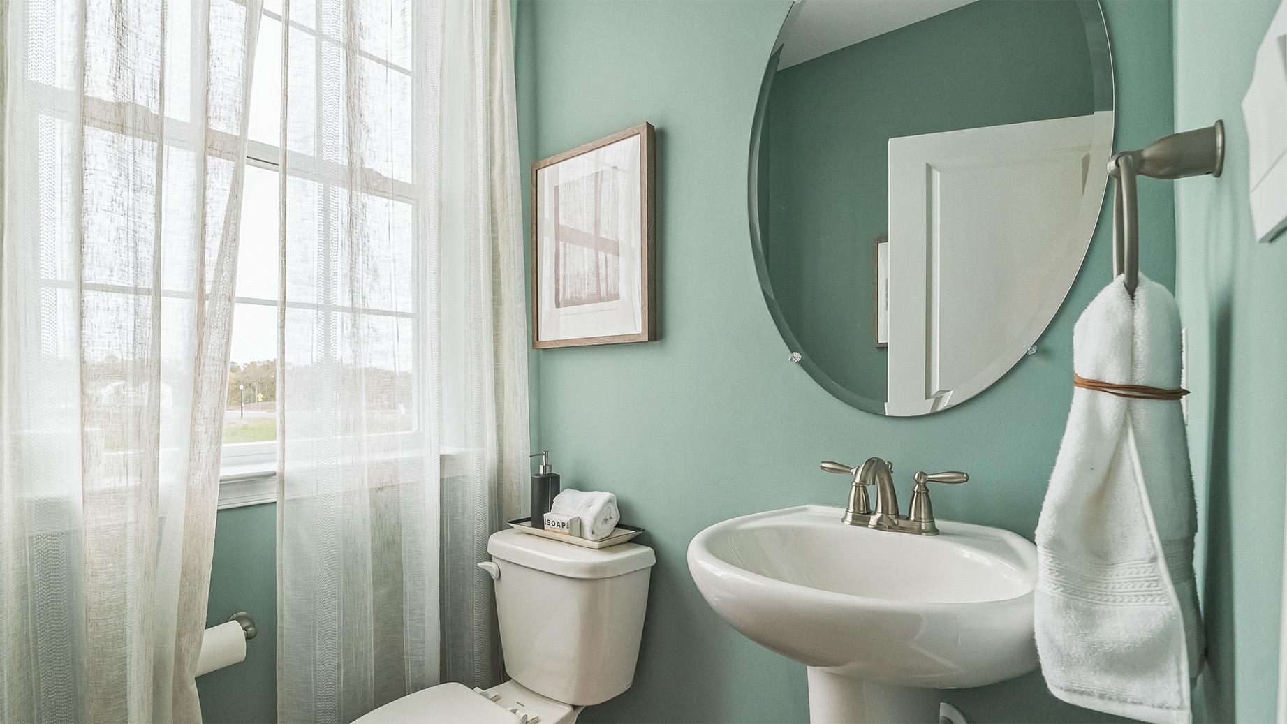 Half bath with single sink.