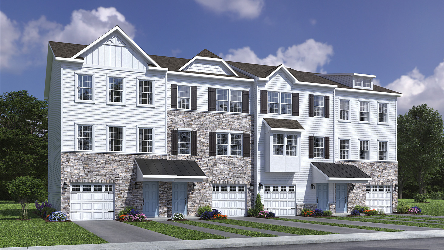 Exterior front image of four connecting townhomes with brick and white horizontal paneling with white single car garage.