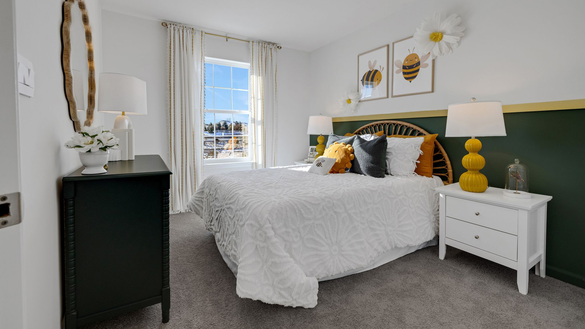 Bedroom three with a full bed and single window.